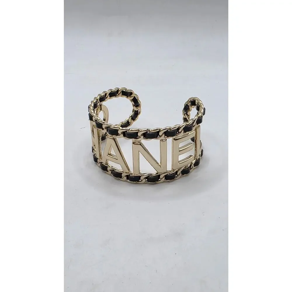 Chanel Gold-tone Leather 'CHANEL' Cuff Bracelet